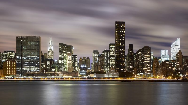 09 Nov 2010 --- Midtown Manhattan along the East River at night --- Image by © Raimund Koch/Corbis