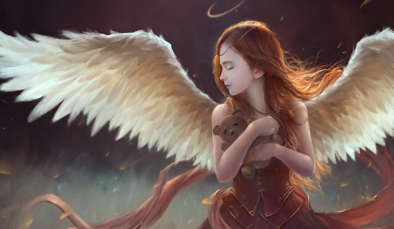 Ángel niña pelirroja con alas