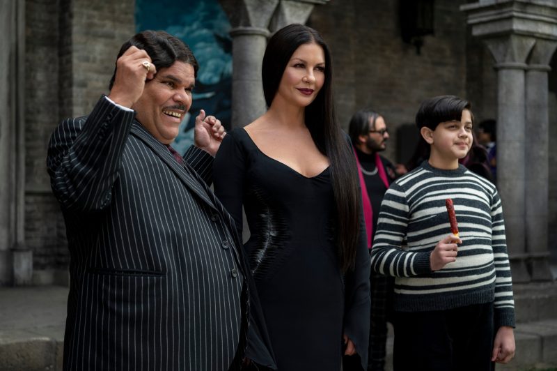 Wednesday. (L to R) Luis Guzmán as Gomez Addams, Catherine Zeta-Jones as Morticia Addams, Issac Ordonez as Pugsley Addams in episode 105 of Wednesday